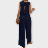 Valeria | Vesta s okrajem z květinových lístků a dlouhé kalhoty